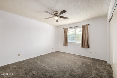 2 bedroom 1.75 bath home with an Arizona room perfect for on Fountain of the Sun Country Club in Arizona - for sale on GolfHomes.com, golf home, golf lot