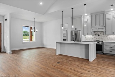 Welcome to East Village! This thoughtfully designed 3-bedroom, 2 on Vache-Grasse Country Club in Arkansas - for sale on GolfHomes.com, golf home, golf lot