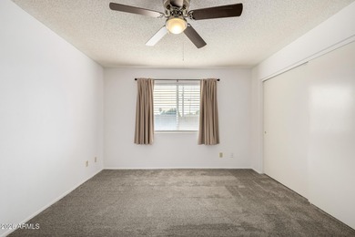 2 bedroom 1.75 bath home with an Arizona room perfect for on Fountain of the Sun Country Club in Arizona - for sale on GolfHomes.com, golf home, golf lot