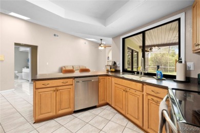 Welcome to this stunning 3-bedroom, 2-bathroom pool home on Oak Hills Country Club in Florida - for sale on GolfHomes.com, golf home, golf lot