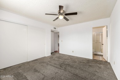 2 bedroom 1.75 bath home with an Arizona room perfect for on Fountain of the Sun Country Club in Arizona - for sale on GolfHomes.com, golf home, golf lot