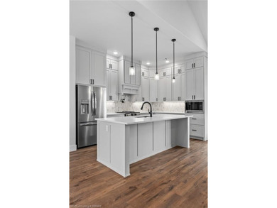 Welcome to East Village! This thoughtfully designed 3-bedroom, 2 on Vache-Grasse Country Club in Arkansas - for sale on GolfHomes.com, golf home, golf lot