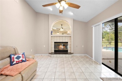 Welcome to this stunning 3-bedroom, 2-bathroom pool home on Oak Hills Country Club in Florida - for sale on GolfHomes.com, golf home, golf lot