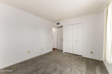 2 bedroom 1.75 bath home with an Arizona room perfect for on Fountain of the Sun Country Club in Arizona - for sale on GolfHomes.com, golf home, golf lot