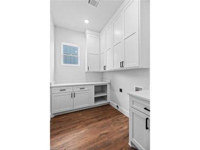 Welcome to East Village! This thoughtfully designed 3-bedroom, 2 on Vache-Grasse Country Club in Arkansas - for sale on GolfHomes.com, golf home, golf lot