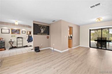 Welcome to this stunning 3-bedroom, 2-bathroom pool home on Oak Hills Country Club in Florida - for sale on GolfHomes.com, golf home, golf lot