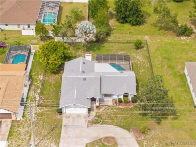Welcome to this stunning 3-bedroom, 2-bathroom pool home on Oak Hills Country Club in Florida - for sale on GolfHomes.com, golf home, golf lot