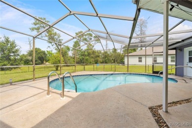 Welcome to this stunning 3-bedroom, 2-bathroom pool home on Oak Hills Country Club in Florida - for sale on GolfHomes.com, golf home, golf lot