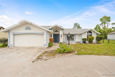 Welcome to this stunning 3-bedroom, 2-bathroom pool home on Oak Hills Country Club in Florida - for sale on GolfHomes.com, golf home, golf lot