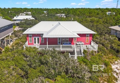 Start your morning with a coffee on the porch swing while you on Kiva Dunes Golf Club in Alabama - for sale on GolfHomes.com, golf home, golf lot