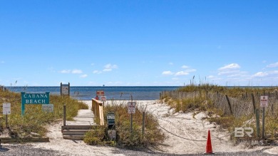 Start your morning with a coffee on the porch swing while you on Kiva Dunes Golf Club in Alabama - for sale on GolfHomes.com, golf home, golf lot
