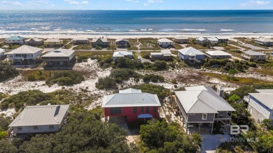 Start your morning with a coffee on the porch swing while you on Kiva Dunes Golf Club in Alabama - for sale on GolfHomes.com, golf home, golf lot