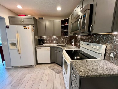 Highly desired ground floor - fully furnished 2 bedrooms, 2 bath on On Top Of The World Golf Course in Florida - for sale on GolfHomes.com, golf home, golf lot