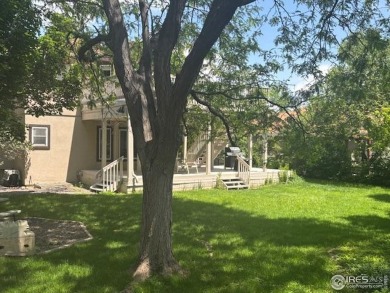 Step into this beautifully updated 5-bedroom, 4-bathroom home in on Ptarmigan Golf Course in Colorado - for sale on GolfHomes.com, golf home, golf lot