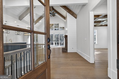 Welcome to 1010 Kimbrough Hill, an exceptional new construction on Reynolds Lake Oconee - The Oconee in Georgia - for sale on GolfHomes.com, golf home, golf lot