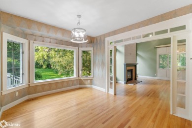 Nestled on over an acre on a scenic private drive, this on Highland Park Golf Course in Iowa - for sale on GolfHomes.com, golf home, golf lot