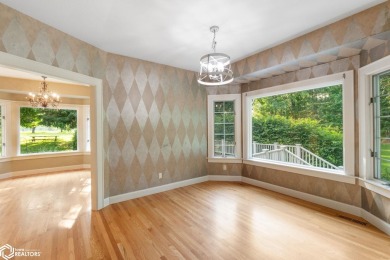 Nestled on over an acre on a scenic private drive, this on Highland Park Golf Course in Iowa - for sale on GolfHomes.com, golf home, golf lot