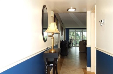 Your dream home with sweeping golf course and pond views! This on Palm-Aire Country Club and Resort - Palms in Florida - for sale on GolfHomes.com, golf home, golf lot