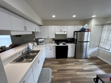 Recently upgraded 2 bedroom, 2 bathroom condo. Second floor unit on Baypoint Golf Club in Florida - for sale on GolfHomes.com, golf home, golf lot