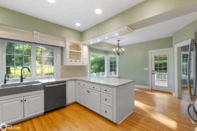 Nestled on over an acre on a scenic private drive, this on Highland Park Golf Course in Iowa - for sale on GolfHomes.com, golf home, golf lot