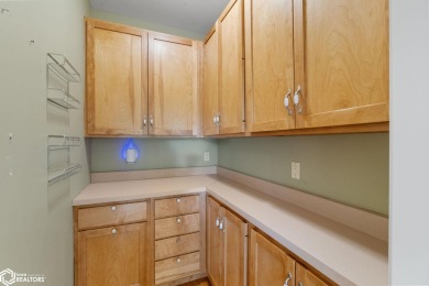 Nestled on over an acre on a scenic private drive, this on Highland Park Golf Course in Iowa - for sale on GolfHomes.com, golf home, golf lot