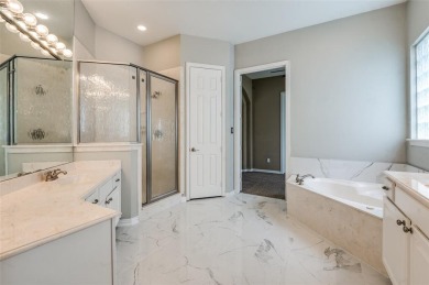 Resort-Style Living with Stunning Water Views in Gated Frisco on Heritage Lakes - Par 3 - 9 Hole Course in Texas - for sale on GolfHomes.com, golf home, golf lot