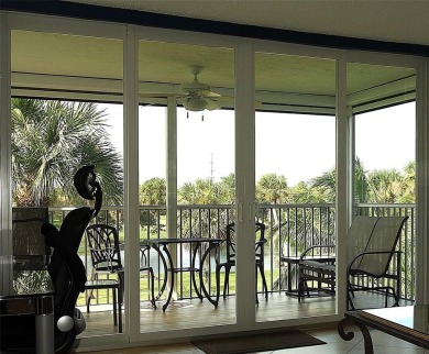 Your dream home with sweeping golf course and pond views! This on Palm-Aire Country Club and Resort - Palms in Florida - for sale on GolfHomes.com, golf home, golf lot
