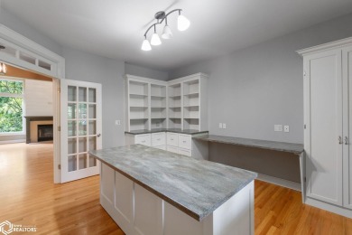 Nestled on over an acre on a scenic private drive, this on Highland Park Golf Course in Iowa - for sale on GolfHomes.com, golf home, golf lot