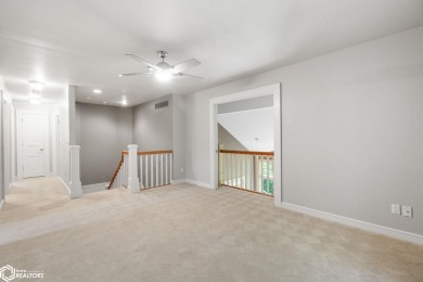 Nestled on over an acre on a scenic private drive, this on Highland Park Golf Course in Iowa - for sale on GolfHomes.com, golf home, golf lot
