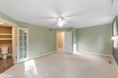 Nestled on over an acre on a scenic private drive, this on Highland Park Golf Course in Iowa - for sale on GolfHomes.com, golf home, golf lot