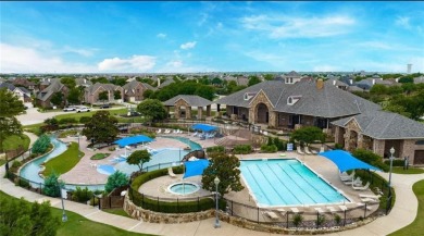 Resort-Style Living with Stunning Water Views in Gated Frisco on Heritage Lakes - Par 3 - 9 Hole Course in Texas - for sale on GolfHomes.com, golf home, golf lot