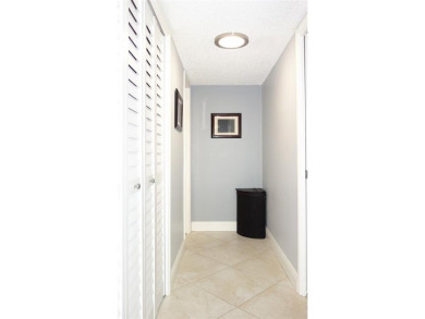Your dream home with sweeping golf course and pond views! This on Palm-Aire Country Club and Resort - Palms in Florida - for sale on GolfHomes.com, golf home, golf lot