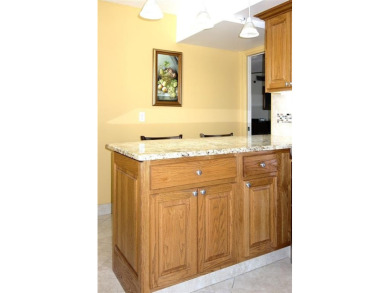 Your dream home with sweeping golf course and pond views! This on Palm-Aire Country Club and Resort - Palms in Florida - for sale on GolfHomes.com, golf home, golf lot