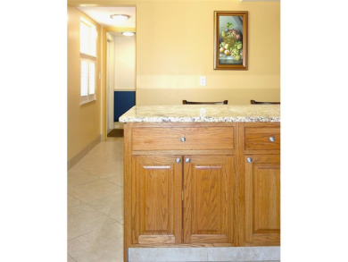 Your dream home with sweeping golf course and pond views! This on Palm-Aire Country Club and Resort - Palms in Florida - for sale on GolfHomes.com, golf home, golf lot