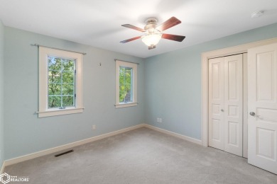 Nestled on over an acre on a scenic private drive, this on Highland Park Golf Course in Iowa - for sale on GolfHomes.com, golf home, golf lot