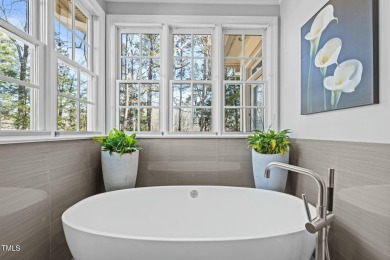 In the heart of Governors Club, welcome to Tryon Court, the best on Governors Club in North Carolina - for sale on GolfHomes.com, golf home, golf lot