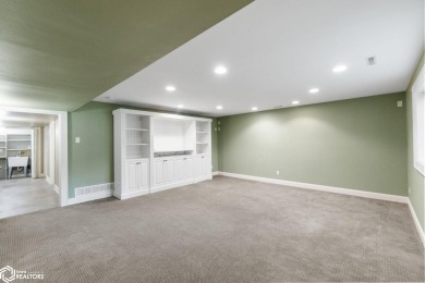 Nestled on over an acre on a scenic private drive, this on Highland Park Golf Course in Iowa - for sale on GolfHomes.com, golf home, golf lot