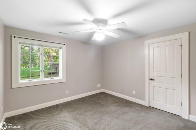 Nestled on over an acre on a scenic private drive, this on Highland Park Golf Course in Iowa - for sale on GolfHomes.com, golf home, golf lot