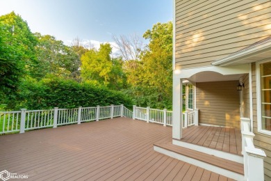 Nestled on over an acre on a scenic private drive, this on Highland Park Golf Course in Iowa - for sale on GolfHomes.com, golf home, golf lot