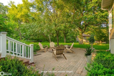 Nestled on over an acre on a scenic private drive, this on Highland Park Golf Course in Iowa - for sale on GolfHomes.com, golf home, golf lot