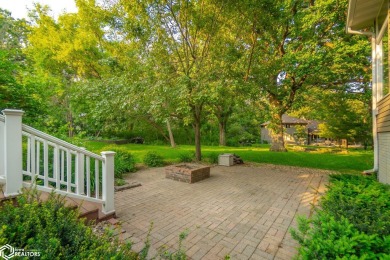 Nestled on over an acre on a scenic private drive, this on Highland Park Golf Course in Iowa - for sale on GolfHomes.com, golf home, golf lot