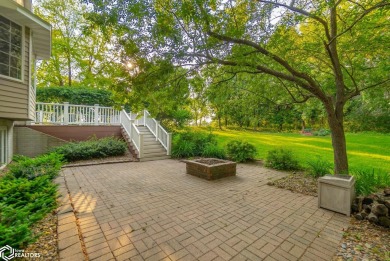 Nestled on over an acre on a scenic private drive, this on Highland Park Golf Course in Iowa - for sale on GolfHomes.com, golf home, golf lot
