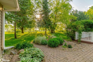 Nestled on over an acre on a scenic private drive, this on Highland Park Golf Course in Iowa - for sale on GolfHomes.com, golf home, golf lot