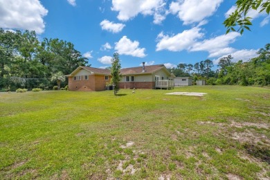 This beautiful 3-4 bedroom, 3 full bath, 2 half bath home offers on Jake Gaither Golf Course in Florida - for sale on GolfHomes.com, golf home, golf lot