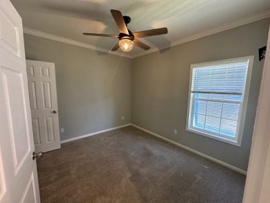 Located in the Foley Grove, a charming land-leased 55+ on Gulf Links Executive Golf Course in Alabama - for sale on GolfHomes.com, golf home, golf lot