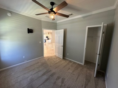 Located in the Foley Grove, a charming land-leased 55+ on Gulf Links Executive Golf Course in Alabama - for sale on GolfHomes.com, golf home, golf lot