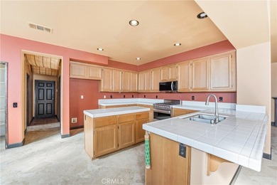 4329 Palazzo Lane is a spacious residence situated in the on Glen Ivy Golf Club in California - for sale on GolfHomes.com, golf home, golf lot