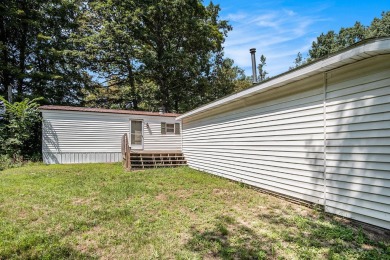 This home is ready for new owners to move right in.  Located on on The Falls At Barber Creek in Michigan - for sale on GolfHomes.com, golf home, golf lot