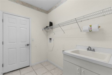 Discover the perfect blend of tranquility and luxury in this on Worthington Country Club in Florida - for sale on GolfHomes.com, golf home, golf lot