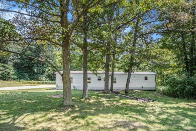 This home is ready for new owners to move right in.  Located on on The Falls At Barber Creek in Michigan - for sale on GolfHomes.com, golf home, golf lot